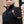 Man holding a black ActionHeat power bank