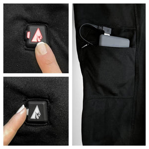 ActionHeat battery pack connected to a garment pocket and finger pressing the power button