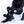 Person wearing black ActionHeat battery heated socks while sitting in snow