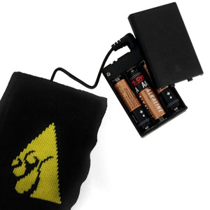 ActionHeat battery pack with AA batteries connected to a black fabric garment