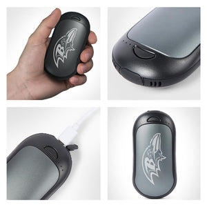 ActionHeat hand warmer with Baltimore Ravens logo being held and charged