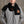 ActionHeat black fleece scarf with Cincinnati Bengals logo and text worn by a man in a grey jacket