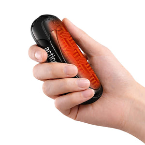ActionHeat hand warmer held in a palm showing an orange geometric heating pattern