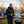 Man wearing Indianapolis Colts jacket grilling at a tailgate party