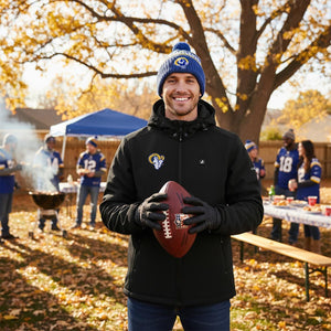Man wearing ActionHeat Rams branded jacket and beanie holding a football at a tailgate party