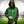 Man wearing a green and black Philadelphia Eagles hooded varsity jacket with snap buttons