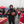 Man wearing ActionHeat San Francisco 49ers jacket and gloves holding a football at a tailgate