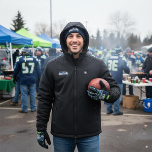 Man wearing Seattle Seahawks branded jacket and beanie holding a football at a tailgate party