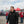 Man wearing black ActionHeat jacket with Tampa Bay Buccaneers logo at a tailgate party