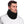 Man wearing a black ActionTech fleece neck gaiter with an adjustable drawstring