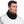Man wearing a black fleece neck gaiter with an adjustable drawstring