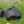 Black Snow Peak and Anker drawstring storage pouch on green grass