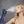 AlphaCool misting water bottle spraying mist onto a woman face