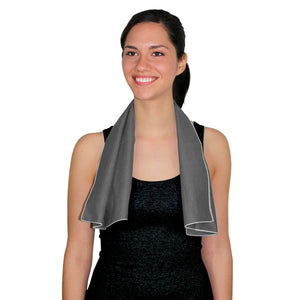 Woman wearing a grey AlphaCool cooling towel around her neck