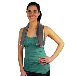Woman wearing a grey AlphaCool cooling towel around her neck