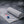 AlphaCool grey cooling towel with New England Patriots logo on textured surface