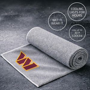 AlphaCool grey cooling towel with Washington Commanders logo on a wet surface