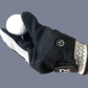 Arctic Reaction heated golf glove holding a white golf ball