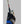Arctic Reaction heated glove worn while holding a fishing rod and reel