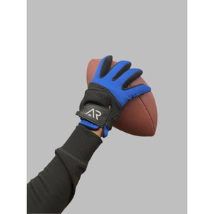 Arctic Reaction blue and black football glove holding a brown football