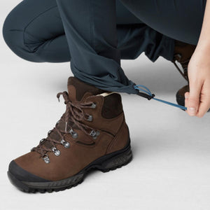 FjallRaven trousers with adjustable drawstring hem worn with brown leather hiking boots