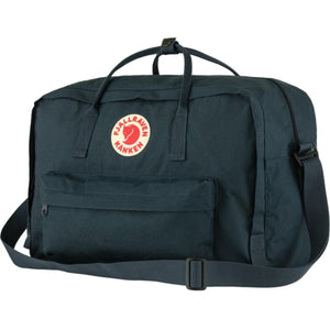 Dark blue FjallRaven Kanken duffel bag with front pocket and shoulder strap