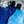 Two Alpha Cool gel cooling packs with black straps surrounded by ice cubes