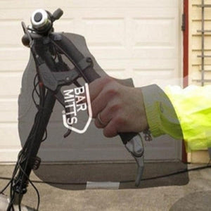 Bar Mitts handlebar cover on a bicycle with a hand inside