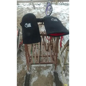 Bar Mitts handlebar covers mounted on a bicycle frame in a snowy environment