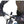 Cyclist hands inside black Bar Mitts handlebar covers attached to bicycle handlebars