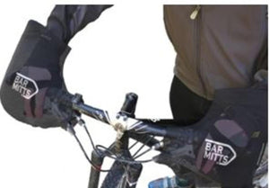 Cyclist hands inside black Bar Mitts handlebar covers attached to bicycle handlebars