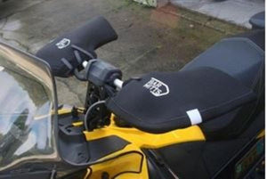 Bar Mitts handlebar covers installed on a yellow motorcycle