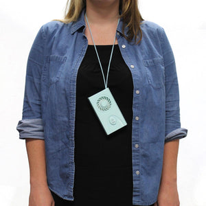 AlphaCool light blue wearable neck fan hanging on a lanyard