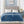 Beautyrest blue electric heated blanket with two controllers on a bed
