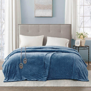 Beautyrest blue heated electric blanket on a bed with two controllers