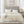 Beautyrest cream heated electric blanket with two handheld controllers on a bed