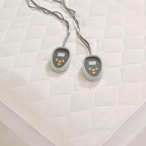 Beautyrest white quilted electric mattress pad with two digital controllers