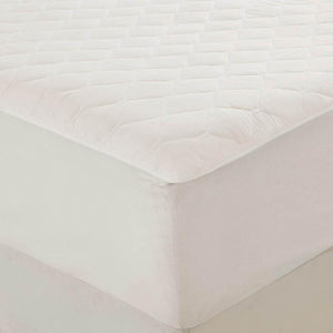 Beautyrest white quilted mattress pad on a mattress corner