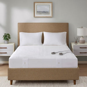 Beautyrest heated mattress pad on a bed with two white pillows