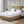 Beautyrest white heated mattress pad on a bed with two pillows