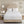 Beautyrest white quilted mattress pad on a bed with two pillows