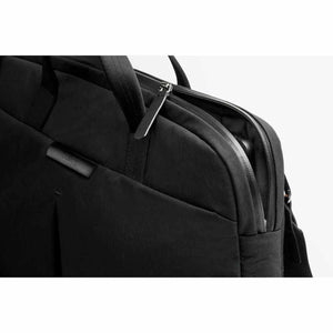 Close up of black Bellroy laptop bag zipper and handle