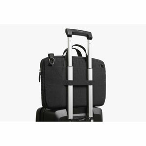 Bellroy black briefcase attached to luggage handle