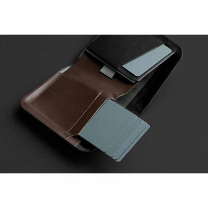 Open Bellroy leather wallet with grey cards inserted in slots