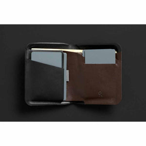 Open Bellroy leather wallet with card slots and cash compartment