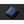 Blue Bellroy leather wallet on a dark background