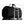 Bellroy black duffel bag secured to a rolling suitcase handle