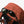 Sunglasses resting on the top zipper pocket of a Bellroy backpack
