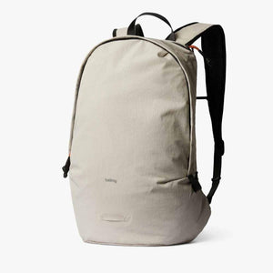 Beige Bellroy backpack with black straps and zipper details