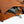 Bellroy backpack pocket containing a phone and wallet with a key clip attached to the exterior